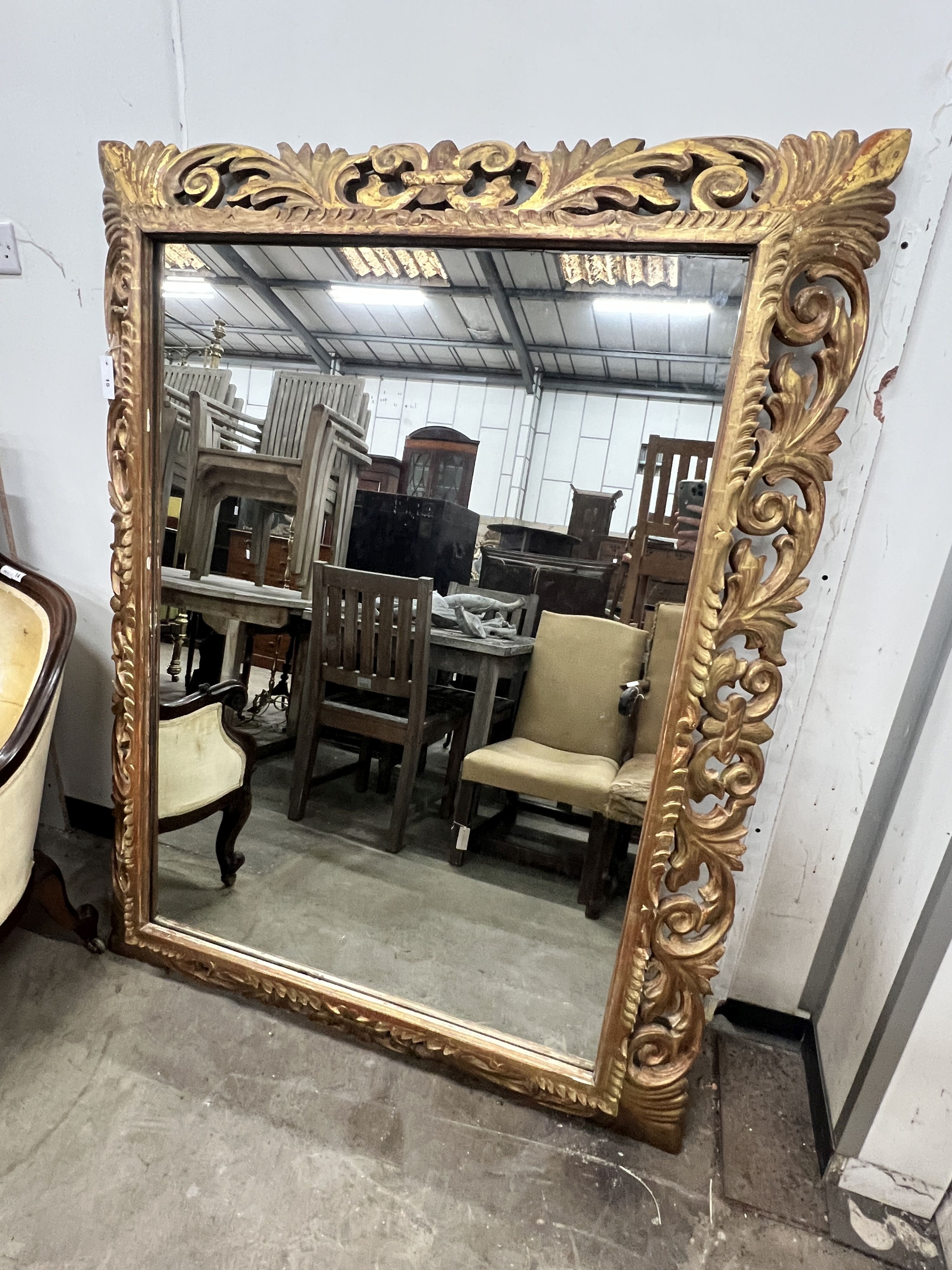 A 19th century rectangular carved giltwood overmantel mirror, width 120cm, height 156cm